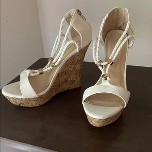 Venus White Wedge Sandals.